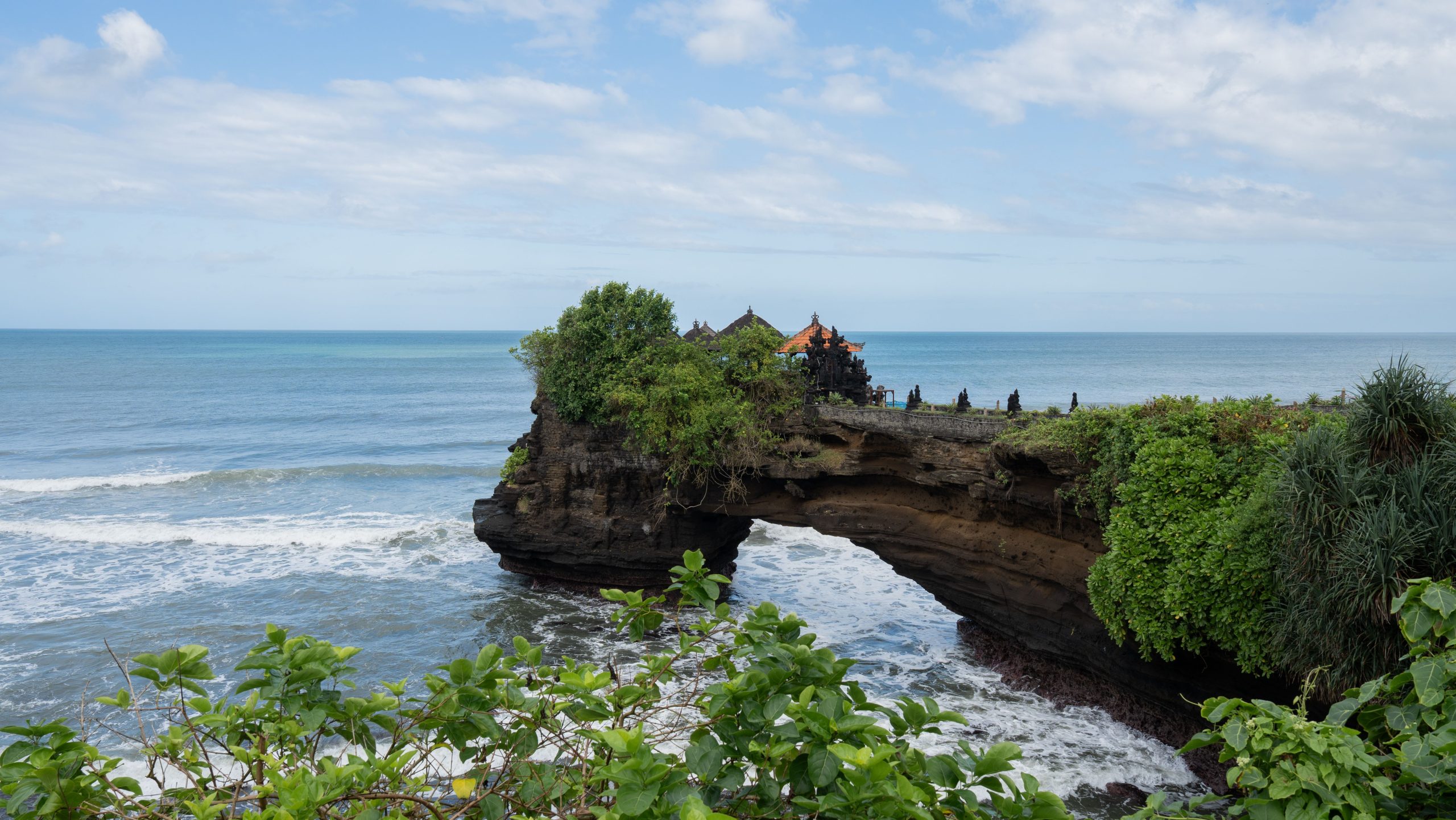 Scenic coastal view of Tanah Lot Temple in Bali Wanderwise travel agency in India